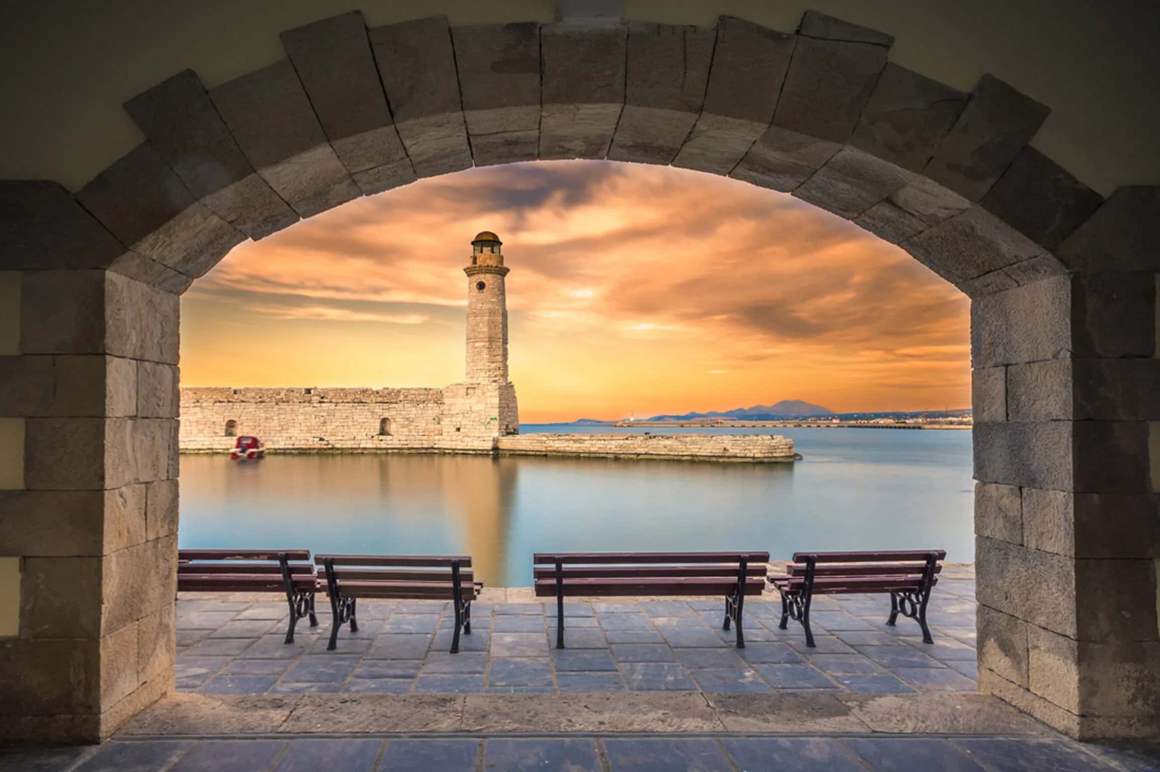 The Egyptian lighthouse at the Venetian harbour of Rethymno at dusk