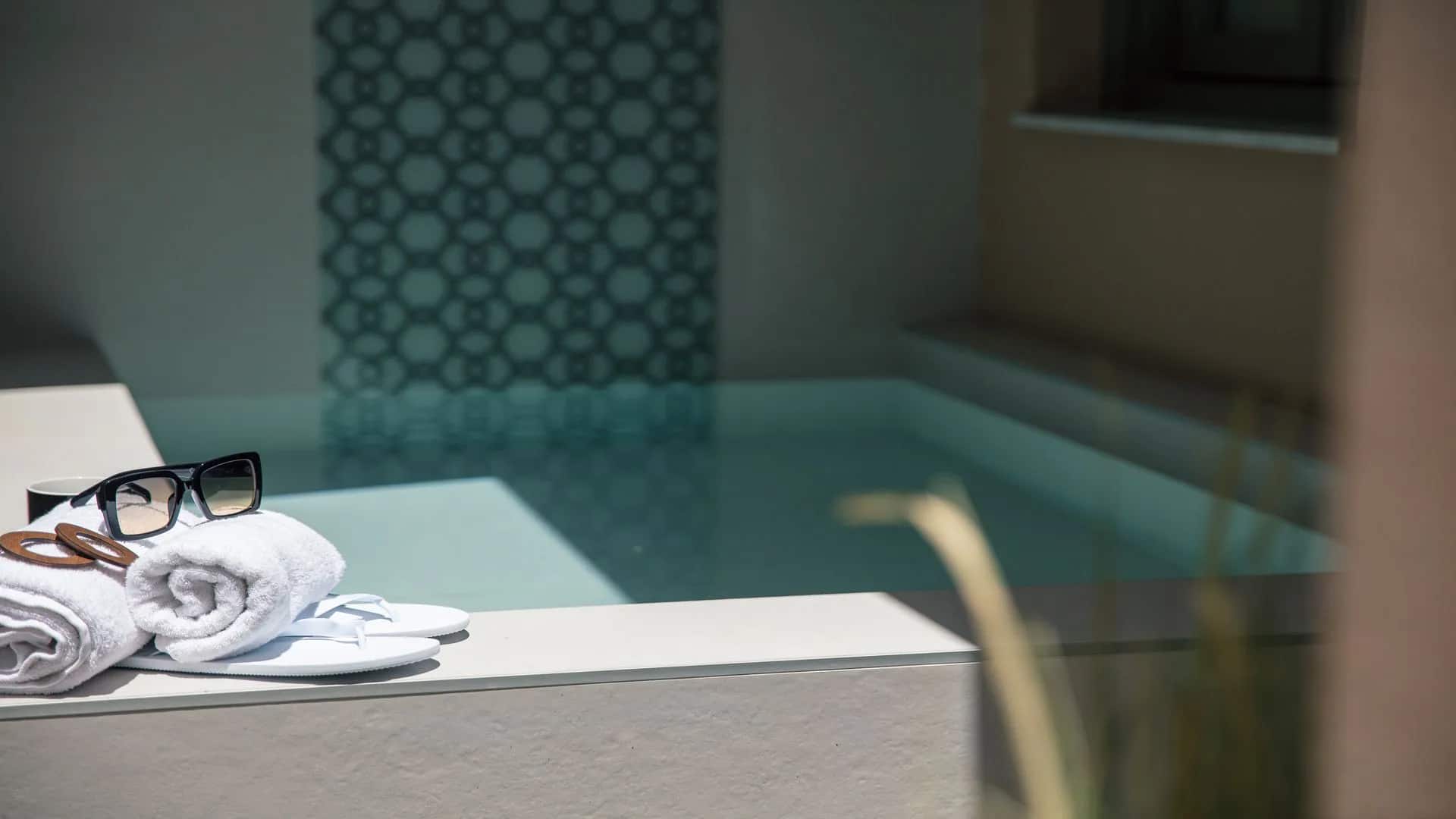 The heated private plunge pool in the interior courtyard of the Harmony suite